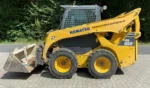 Baustellen-Kompaktlader KOMATSU SK 820 – 2012 (Professionelle geländegängige Ausrüstung) – Bild 2