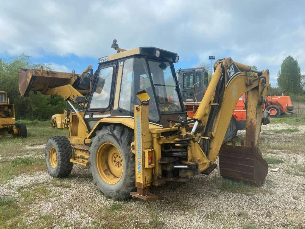 4-14-4.webp Baggerlader CATERPILLAR 428B 1995 – Bild 1